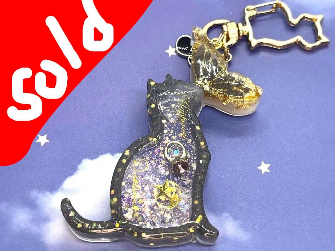 黒猫リング入りシェイカーキーホルダー　シャカシャカキーホルダー　レジン